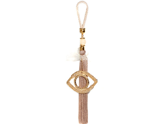 Wedding favor with eye and tassel